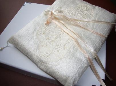 Ivory Silk Dupion Ring cushion with two pearl and embroidered heart motifs, ribbons and bows. 18x22cm Romantic and feminine.